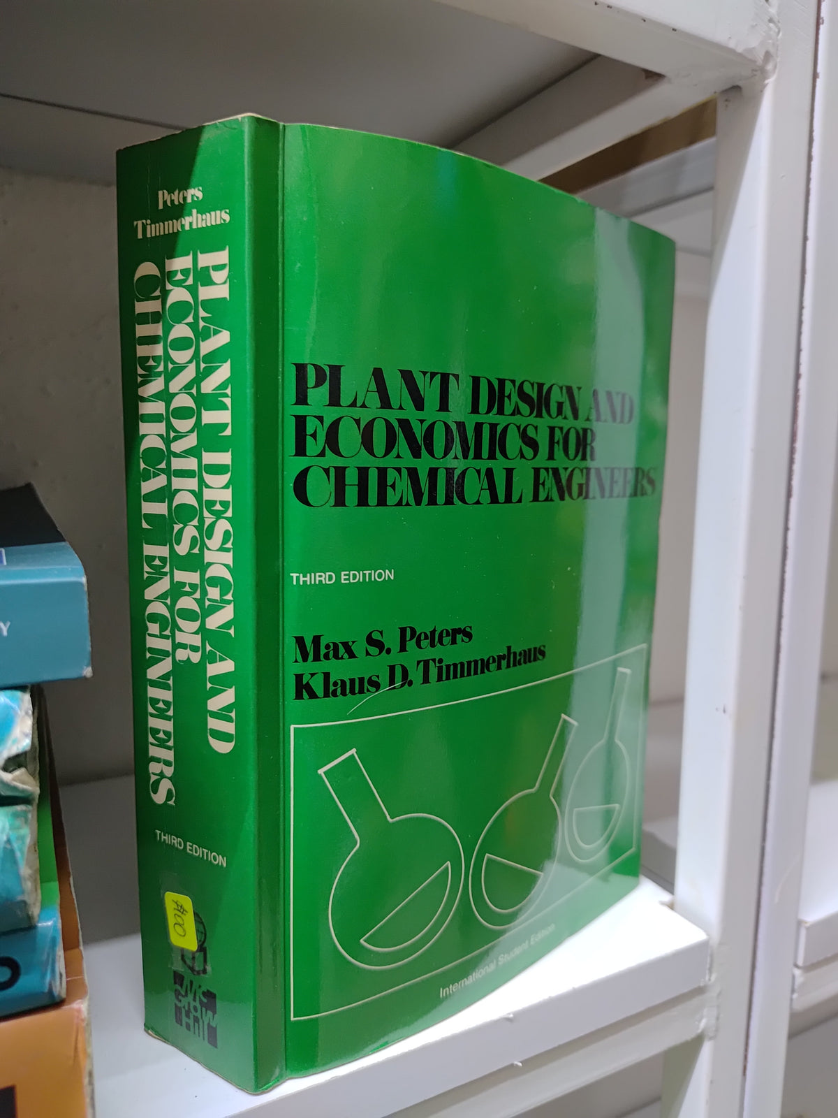 PLANT DESIGN AMD ECONOMICS FOR CHEMICAL ENGINEERS POR MAX S. PETERS USADO MATEMÁTICAS JUAREZ 515