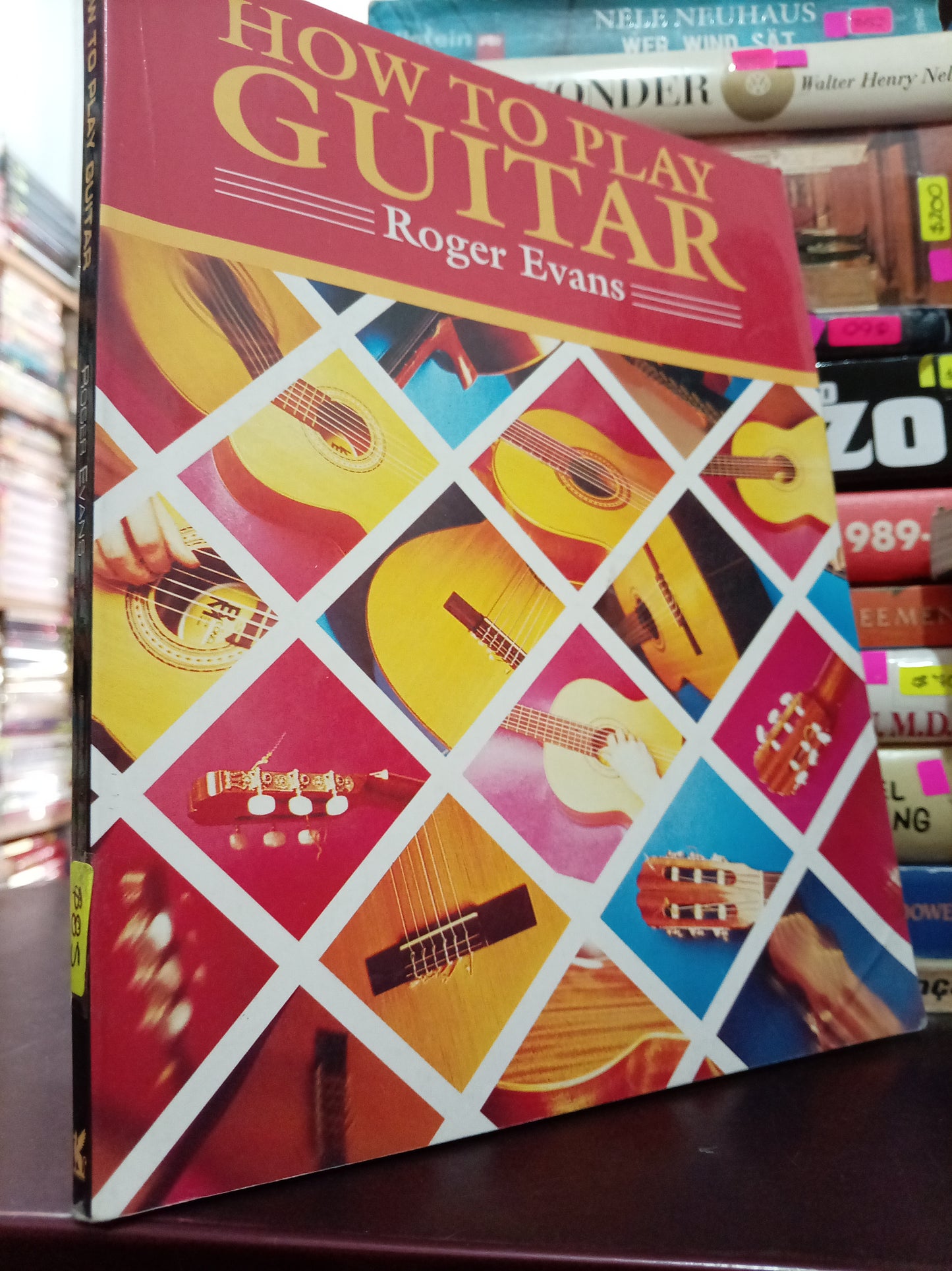 HOW TO PLAY GUITAR POR ROGER EVANS USADO IDIOMAS LITERARIO 305