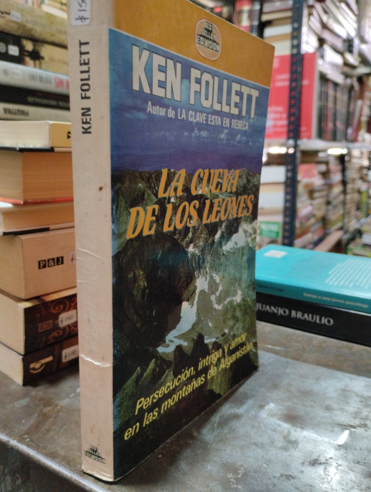LA CUEVA DE LOS LEONES POR KEN FOLLETT USADO NOVELAS ALDAMA
