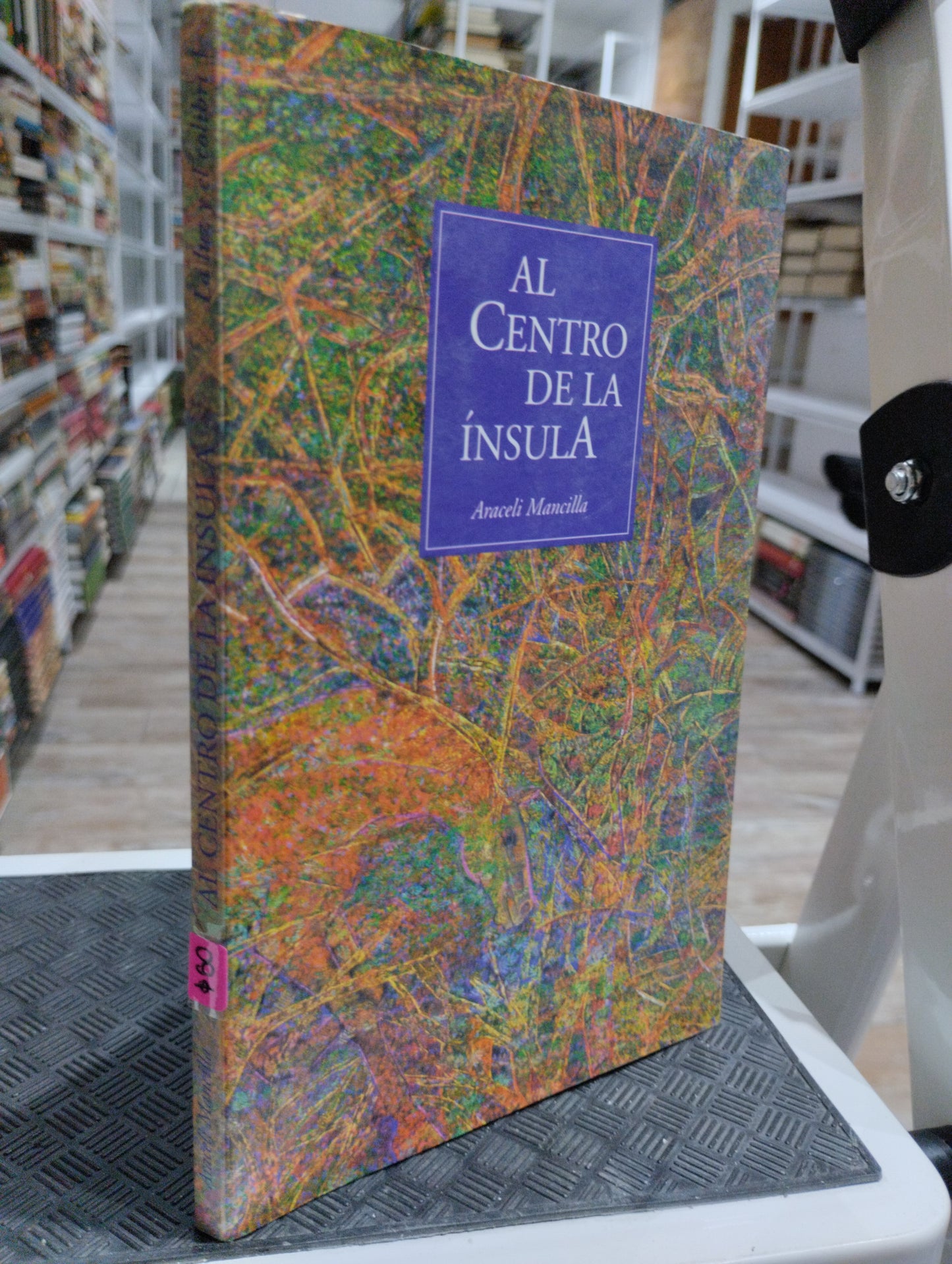 AL CENTRO DE LA INSULA POR ARACELI MANCILLA USADO POESIA JUAREZ 515