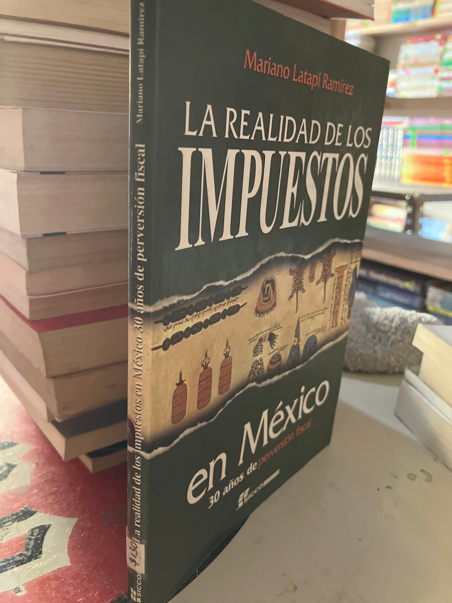 LA REALIDAD DE LOS IMPUESTOS POR MARIANO LATAPI RAMÍREZ USADO POLÍTICA LITERARIO 207