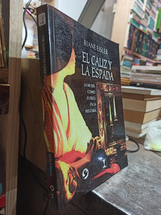 EL CALIZ Y LA ESPADA POR RIANE EISLER USADO NOVELAS ALDAMA