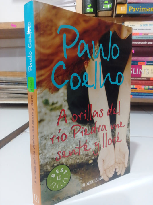 A ORILLAS DEL RIO PIEDRA ME SENTE Y LLORE POR PAULO COELHO USADO SUP.PERSONAL JUAREZ