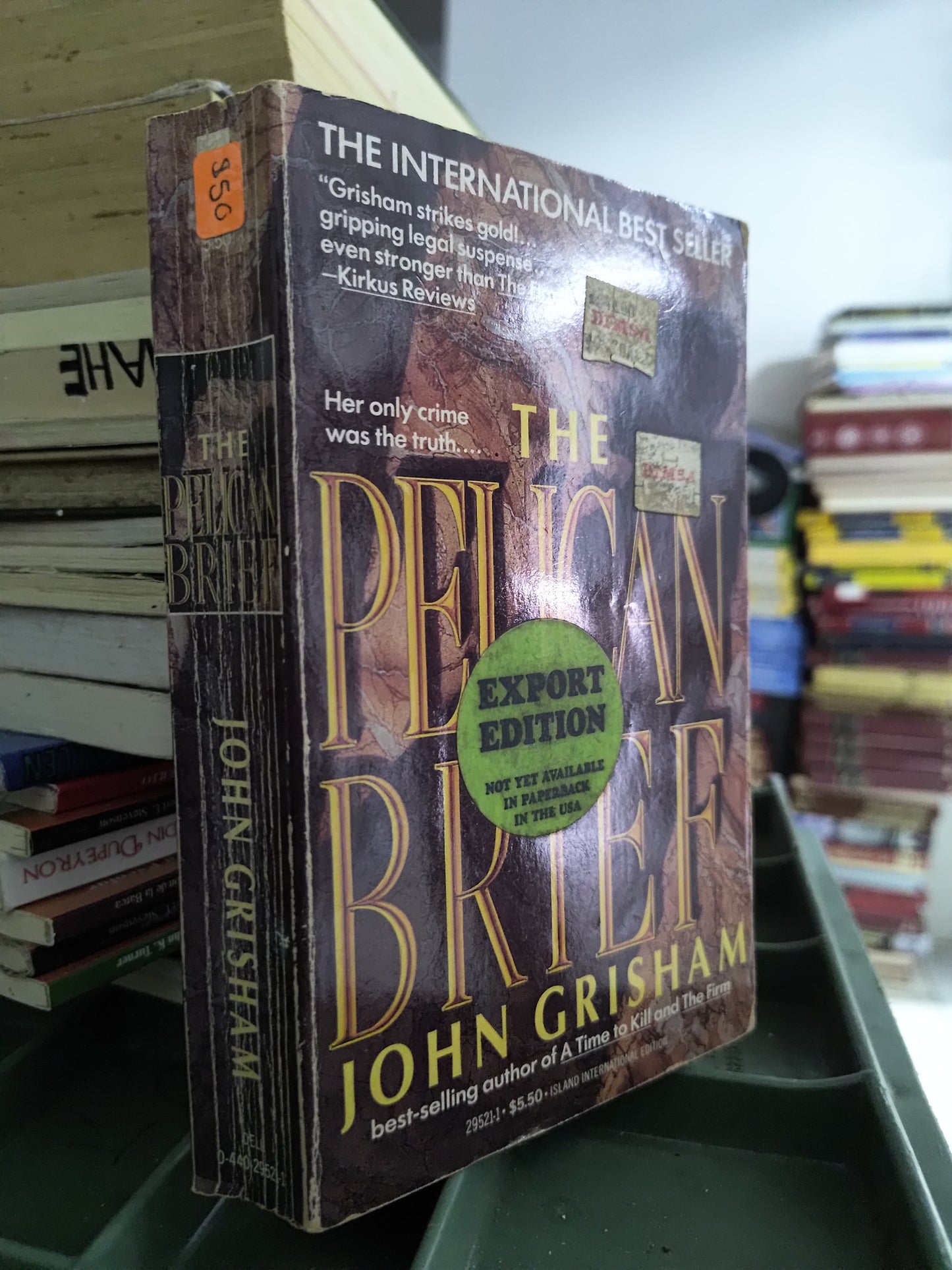 THE PELICAN BRIEF POR JOHN GRISHAM USADO IDIOMAS JUAREZ 515