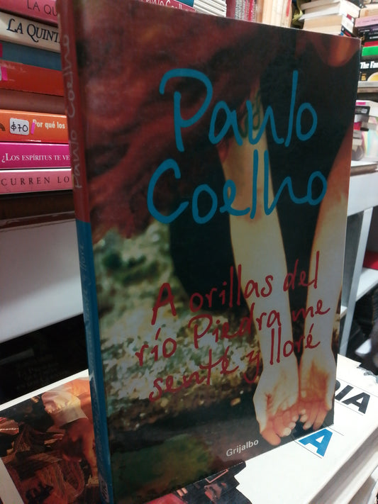 AHORILLAS DEL RIO PIEDRA ME SENTE Y LLORE POR PAULO COELHO USADO SUPERACIÓN PERSONAL JUÁREZ