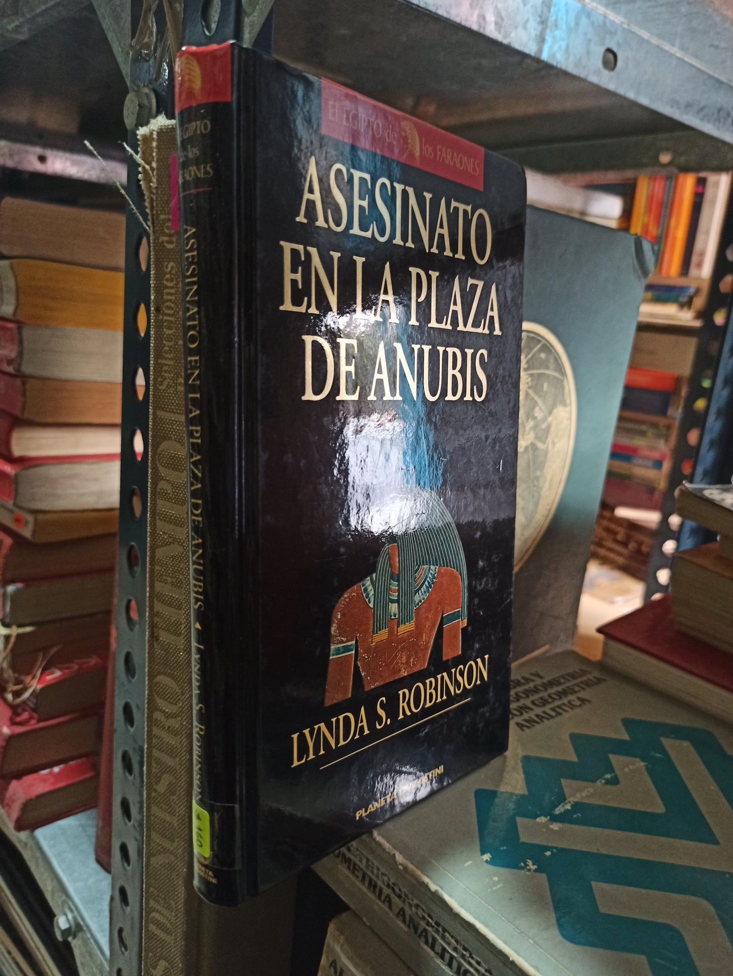 ASESINATO EN LA PLAZA DE ANUBIS LYNDA S. ROBINSON USADO NOVELAS ALDAMA