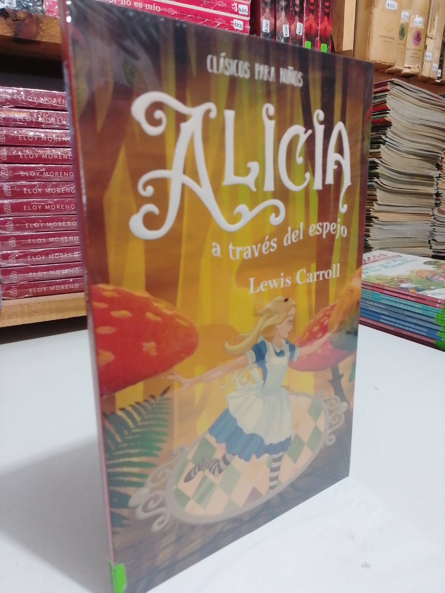 ALICIA A TRAVÉS DEL ESPEJO POR LEWIS CARROL NUEVO JUAREZ
