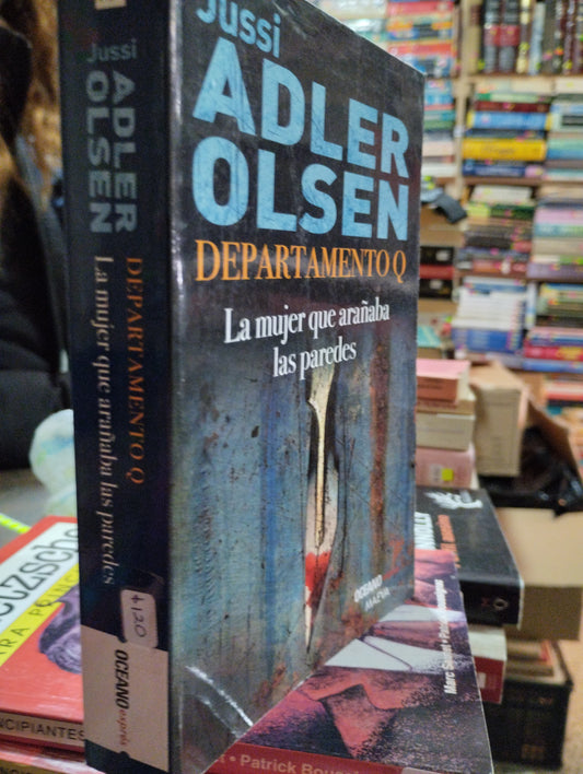 DEPARTAMENTO Q LA MUJER QUE ARAÑABA LAS PAREDES POR JUSSI ADLER OLSEN USADO NOVELAS ALDAMA